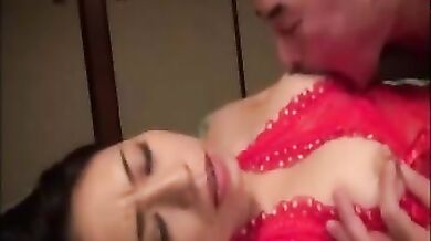 Mature Japanese Beauty in Red