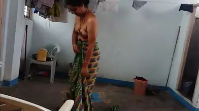 Mature Indian Woman Prepares for Sex