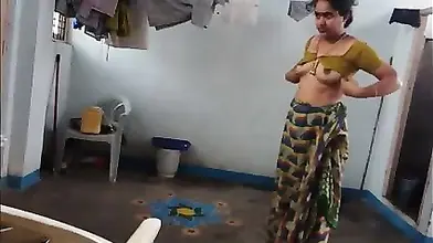 Mature Indian Woman Prepares for Sex