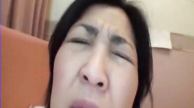 Sexy Japanese Milf Fingers Her Bushy Pussy