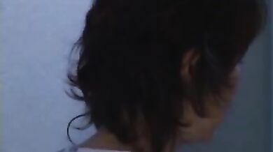 Brunette Japanese MILF Sticks It Deep