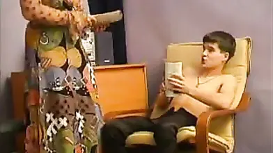 Mature Redhead Seduces Young Guy