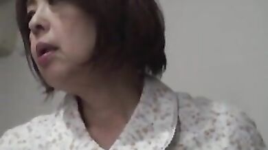 Mature Japanese Woman Seduces Young Man