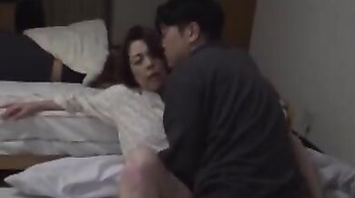 Mature Japanese Woman Seduces Young Man