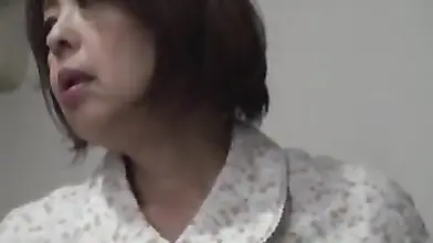 Mature Japanese Woman Seduces Young Man