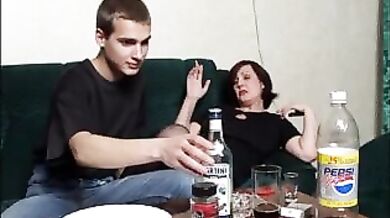 Mature Babe and Young Dude on Sofa