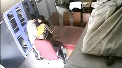 Couple's Secret Living Room Kiss