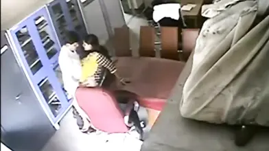 Couple's Secret Living Room Kiss