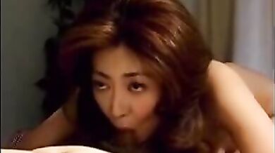 Japanese MILF Enjoys Licking Her Man